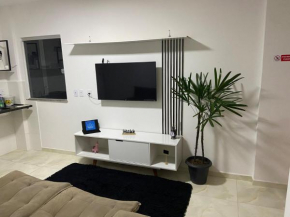 Flat elegante e bem localizado